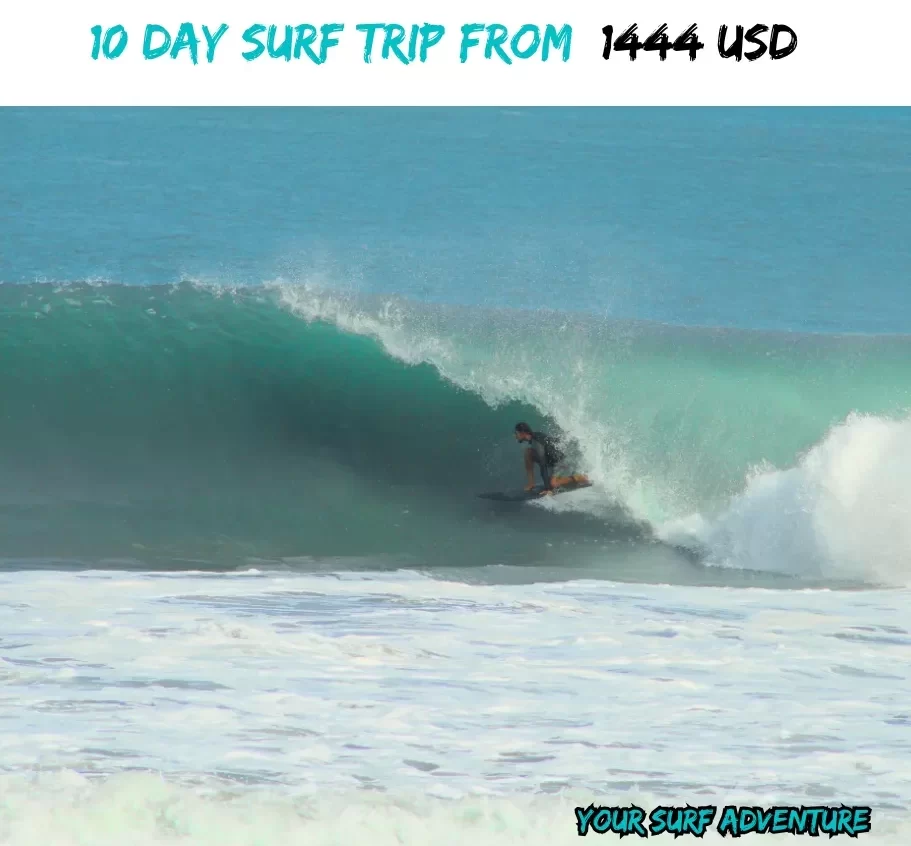 "A surfer carving through a powerful wave during a 10-day surf retreat in Oaxaca. The adventure takes you into the heart of perfect surf conditions, with uncrowded waves and the freedom to push limits while exploring some of Mexico's best surf spots."