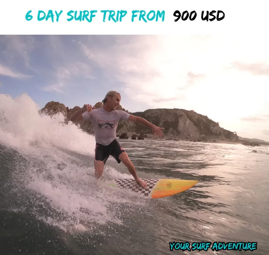 "A surfer paddling into a big, pristine wave during a 6-day surf trip in Salina Cruz, Oaxaca. The scene captures the excitement of chasing perfect waves, with the surfer immersed in the raw, untamed surf conditions of one of Mexico's top surf spots."